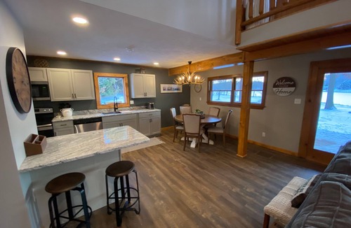 Treasure Lake House | Lakefront 4 Bedroom 2.5 Bath Hot Tub, Firepit, Dock, Deck and great backya