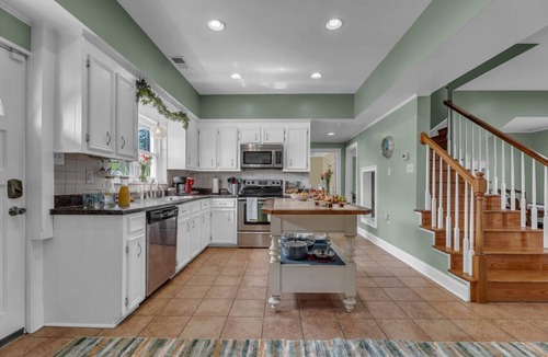 Greenwood House | Lakefront Getaway with Dock, Pool, Sunset Games