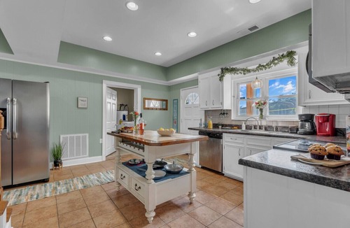 Greenwood House | Lakefront Getaway with Dock, Pool, Sunset Games