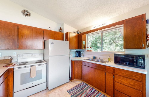 Rathdrum House | Lakefront home with private dock, large yard, wood stove, firepit, grill, W/D