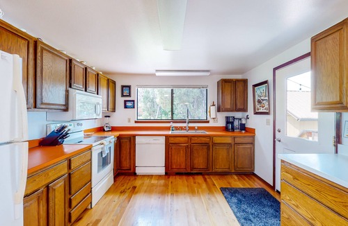 Big Arm House | Lakefront home with private beach, dock, firepit, & grill - dazzling sunset view