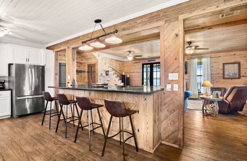 Florien House | Lakefront Luxury with Private Dock, Game Room, Sunset Views & Sleeps 14