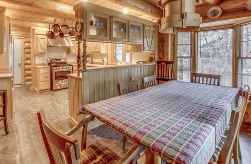 Sandpoint House | Lakefront true log home w/private hot tub, dock & heated floors