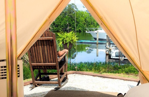 Eutawville RV Rental | Lakeside Glamping Tent with Kayaks & Spacious Deck in Eutaw Springs, South Carolina