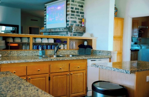 St. Charles Hostel | Lakeside Oasis with Mountain Views