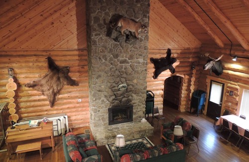 Big Timber House | Large log building in the country near a creek