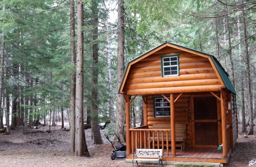 Priest River House | Located in a private wooded area with a lovely creekfront trail to explore.