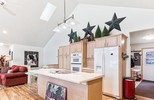 Worley House | Lovely Oasis in the Trees w/Wraparound Deck, Lake View, Pool Table, & Game Room