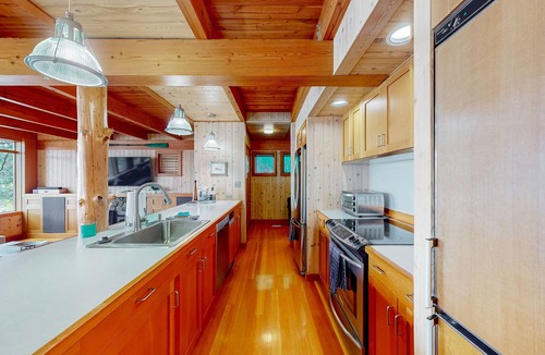 Hayden Lake House | Luxe, lakefront home with dock, amazing lake views, patio & fireplace