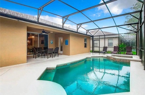Calabria House | Luxury 5BR Waterfront Retreat w/Pool, Hot Tub & Game Room Near Disney