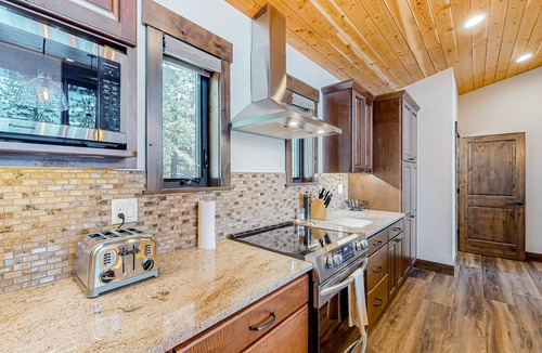 Harrison House | Luxury brand-new lake home with a dock, large deck, fireplace, & Ping-Pong