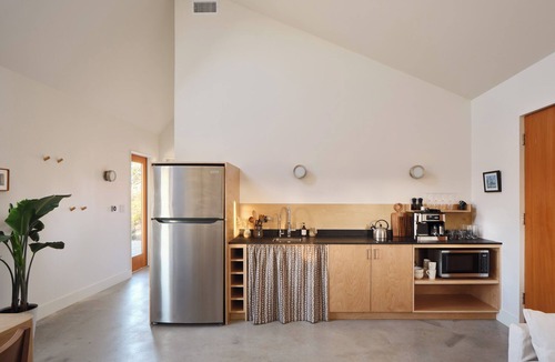 Stonewall Cabin | Luxury cabin in the TX Wine Country with porch, hot tub, grill and fire pit.