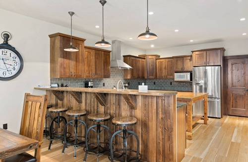 Red Lodge House | Luxury creek side cabin with 4 master bedrooms & 1000 feet of creek side decks