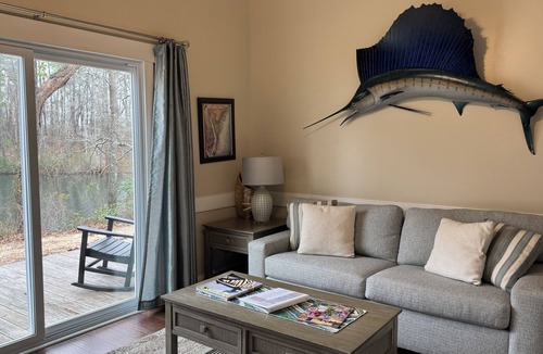 Elizabethtown Resort | Luxury Lodging, Lakefront View, Queen Bed w/Private Bath, Private Patio.