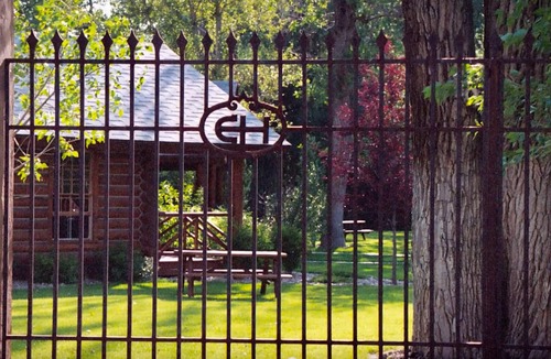 Ennis Cabin | Main House – Restored Historic Log Cabin, known as the Ennis Homestead