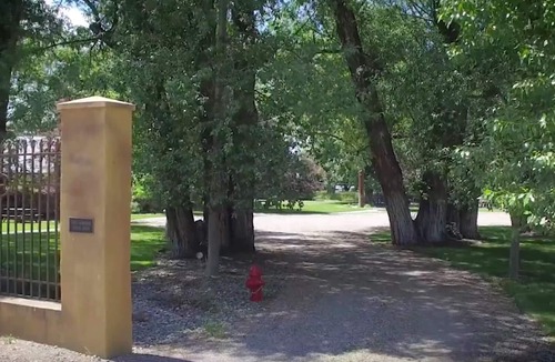 Ennis Cabin | Main House – Restored Historic Log Cabin, known as the Ennis Homestead