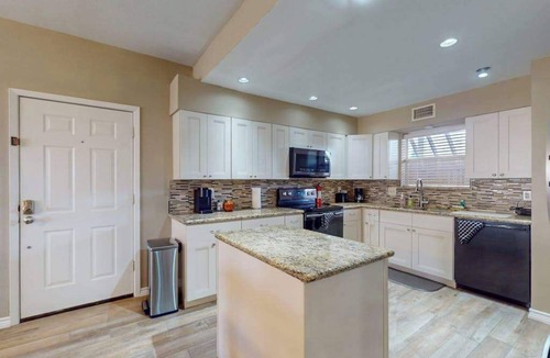 El Lago Condo | Mariner Village 108 | 2BR waterfront with on-site pool & water view