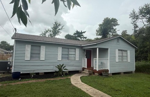 Clute House | Mermaid by the coast near refineries and beach