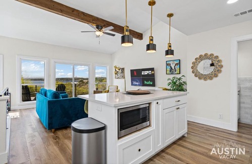 Comanche Trail House | Mins to Lake Travis and The Oasis 1BR 1 5BA Chic Retreat w Views by Austin Vacay