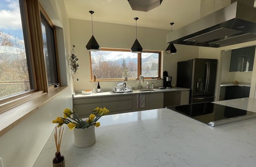 Riverfront Apartment | Modern, bright and spacious apartment with mountain views.