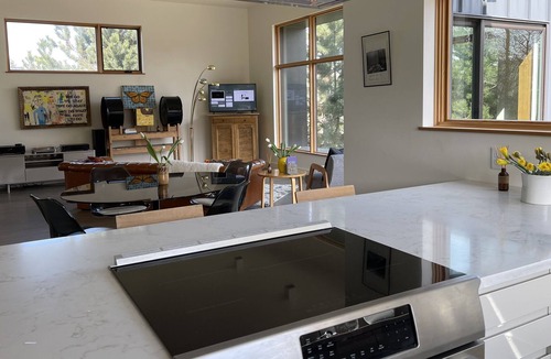 Riverfront Apartment | Modern, bright and spacious apartment with mountain views.