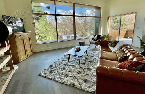 Riverfront Apartment | Modern, bright and spacious apartment with mountain views.