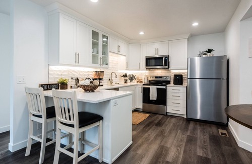 Logan Apartment | Modern hideaway in Logan Utah with changing sand table.