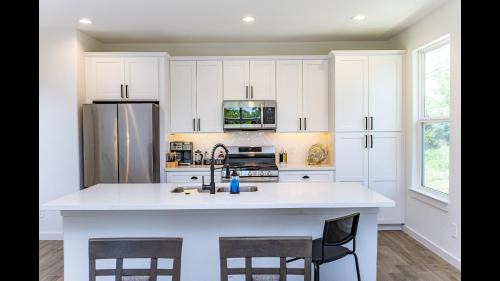 Foster Place House | Modern Home by College, Medical Center & Stadium