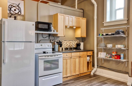 Sheridan Apartment | Modern Industrial Western Suite, Directly Downtown