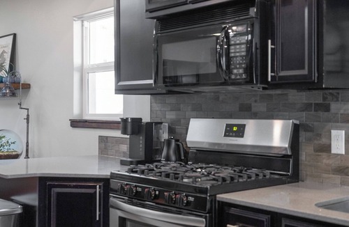 North Park House | Modern pet friendly retreat minutes from downtown, airport & hospital corridor.