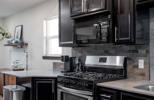 North Park House | Modern pet friendly retreat minutes from downtown, airport & hospital corridor.