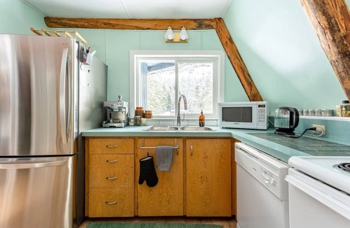 Hemlock Valley Cabin | Mountain side mid-century 70's A-frame with wood fire & hot tub