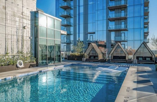 Rainey Street Historic District Apartment | Natiivo 12th flr condo with two balconies, full kitchen & rooftop pool, gym