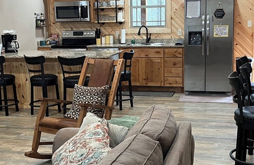 Carlisle Cabin | New Cabin on Private Lake with Hot Tub, Gas Grill, Fire Pit & Swings