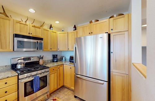 Saddle Ridge House | Newly updated condo with ski-In/ski-out access, a private hot tub & more