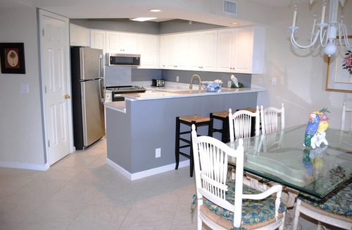 Litchfield by the Sea Condo | Oceanfront condo with private stairs from balcony and pool access in Litchfield By the Sea.