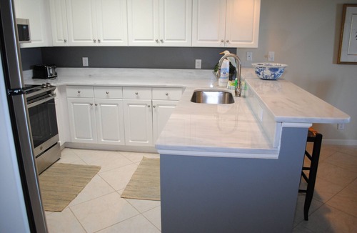 Litchfield by the Sea Condo | Oceanfront condo with private stairs from balcony and pool access in Litchfield By the Sea.
