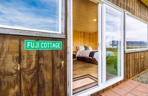 Whitehall Cottage | Off-grid tiny home in apple orchard with million-dollar mountain views!