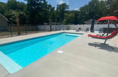 Ocean Isle Beach House | Paradise Retreat Hot tub Dock Drive to Beach