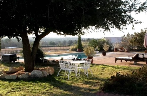 Paige Cabin | Pet-Friendly Accommodation on a Ranch in McDade, Texas
