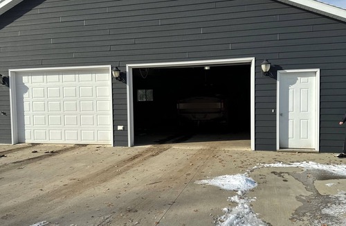 Roscoe House | Pet friendly and fenced in backyard! Heated garage!