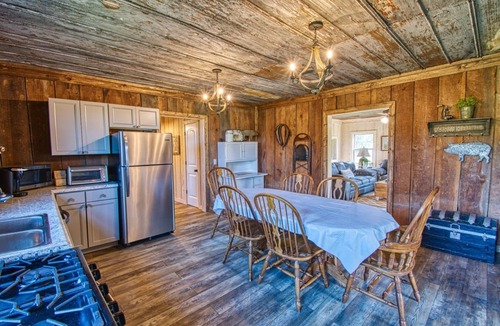Alix Cabin | Picturesque perch next to the Mulberry River with instant access to Oark AR!