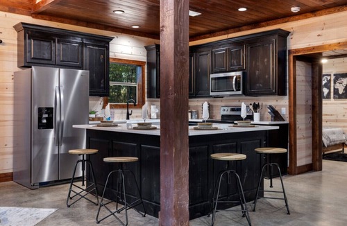 Pickens Cabin | Poolside Par-Tee · Putt & Swim: Mini Golf, Heated Pool & Shuffleboard
