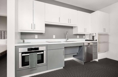 Iowa City Hotel | Prime Downtown Iowa Stay – 2 Elegant Units Near Campus & Live Music