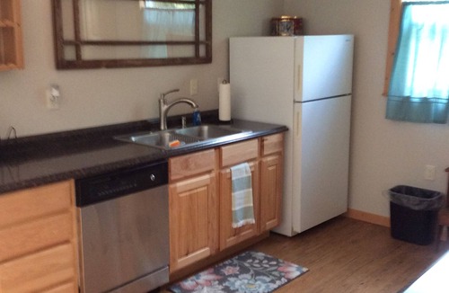 Big Arm House | Prime Lakefront home w/guest house - extra charge, dock, firepit, large yard