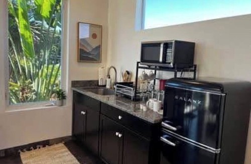 East Naples Apartment | Private Tree Top studio - 1 mile to 5th Ave, all the action & Naples Beach!