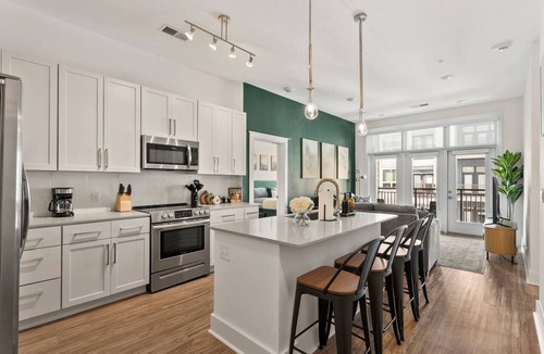 Second Ward Apartment | Queen City Haven - Free Parking, Pool, Balcony
