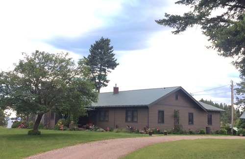 Woods Bay House | RARE FIND: Over 200' of Flathead Lake Lakefront with distinctive home