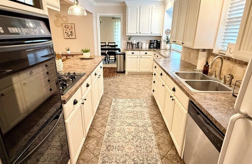 Waxahachie House | Refuge on Trinity. Boho Farmhouse, Game Room, Fire Pit