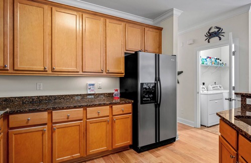 Supply Condo | RELAX in this spacious serene end unit Condo.Pool and dock with club house.